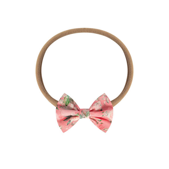 Pink floral tie back hair accessory
