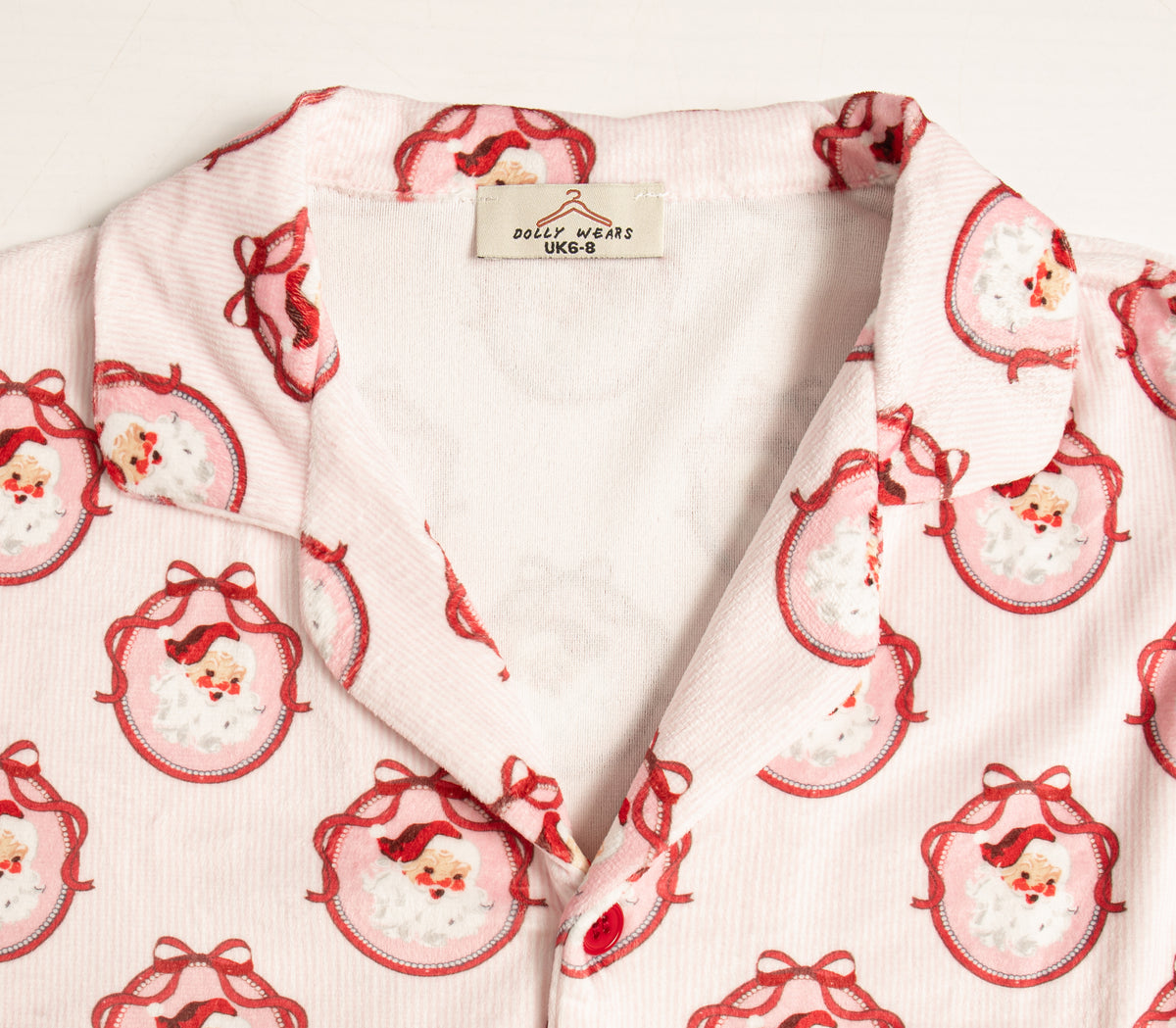 Pink Santa stripe women’s buttoned pyjamas