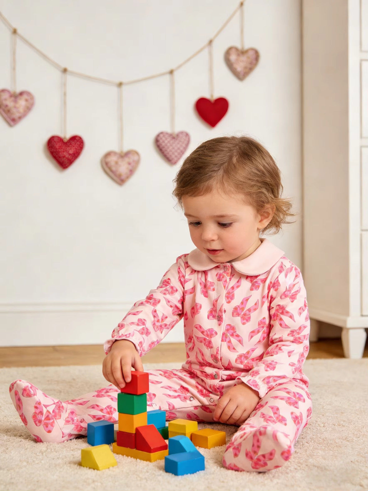 Bows & hearts sleepsuit