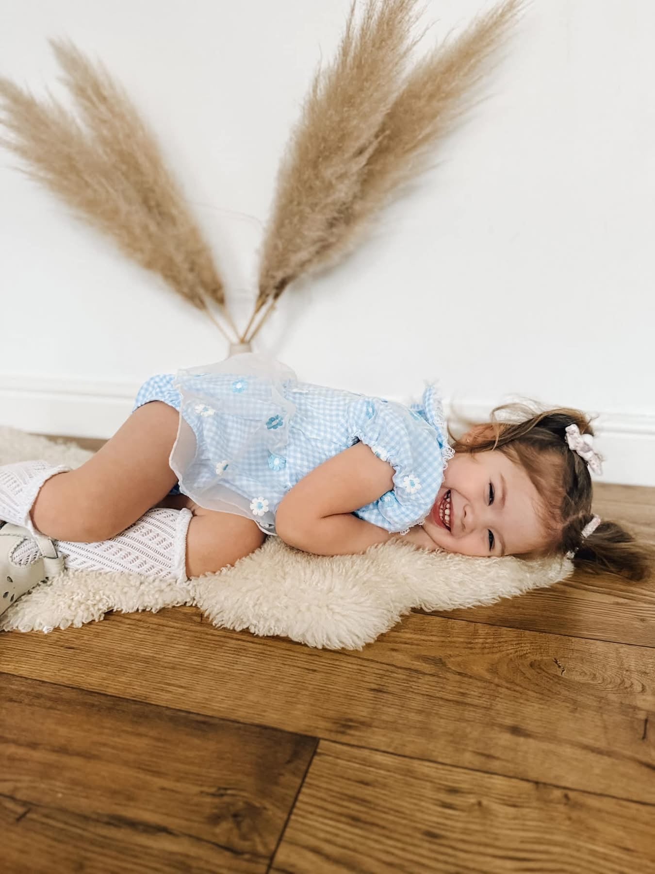 Blue gingham daisy lace romper