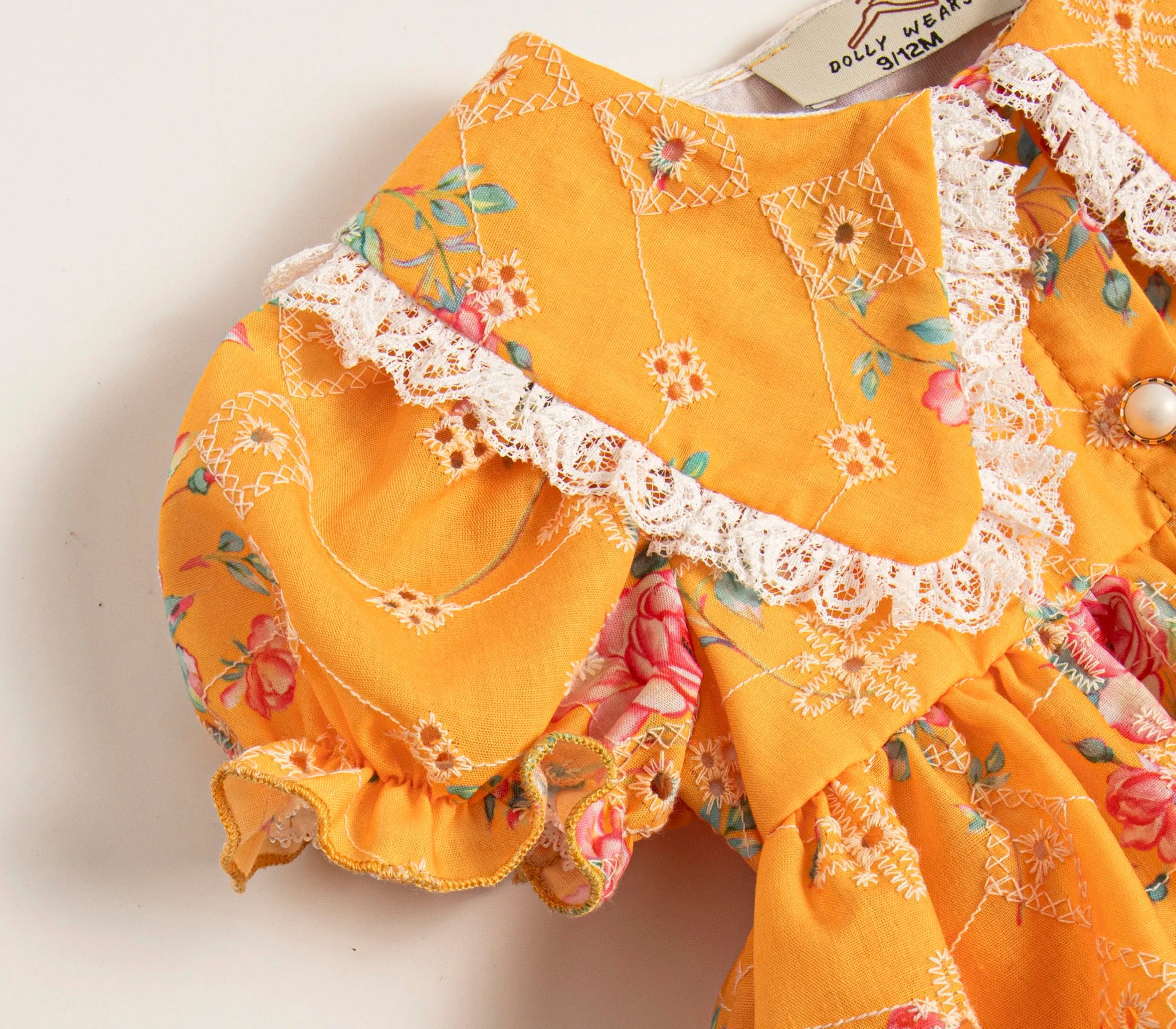 Apricot anglaise buttoned romper