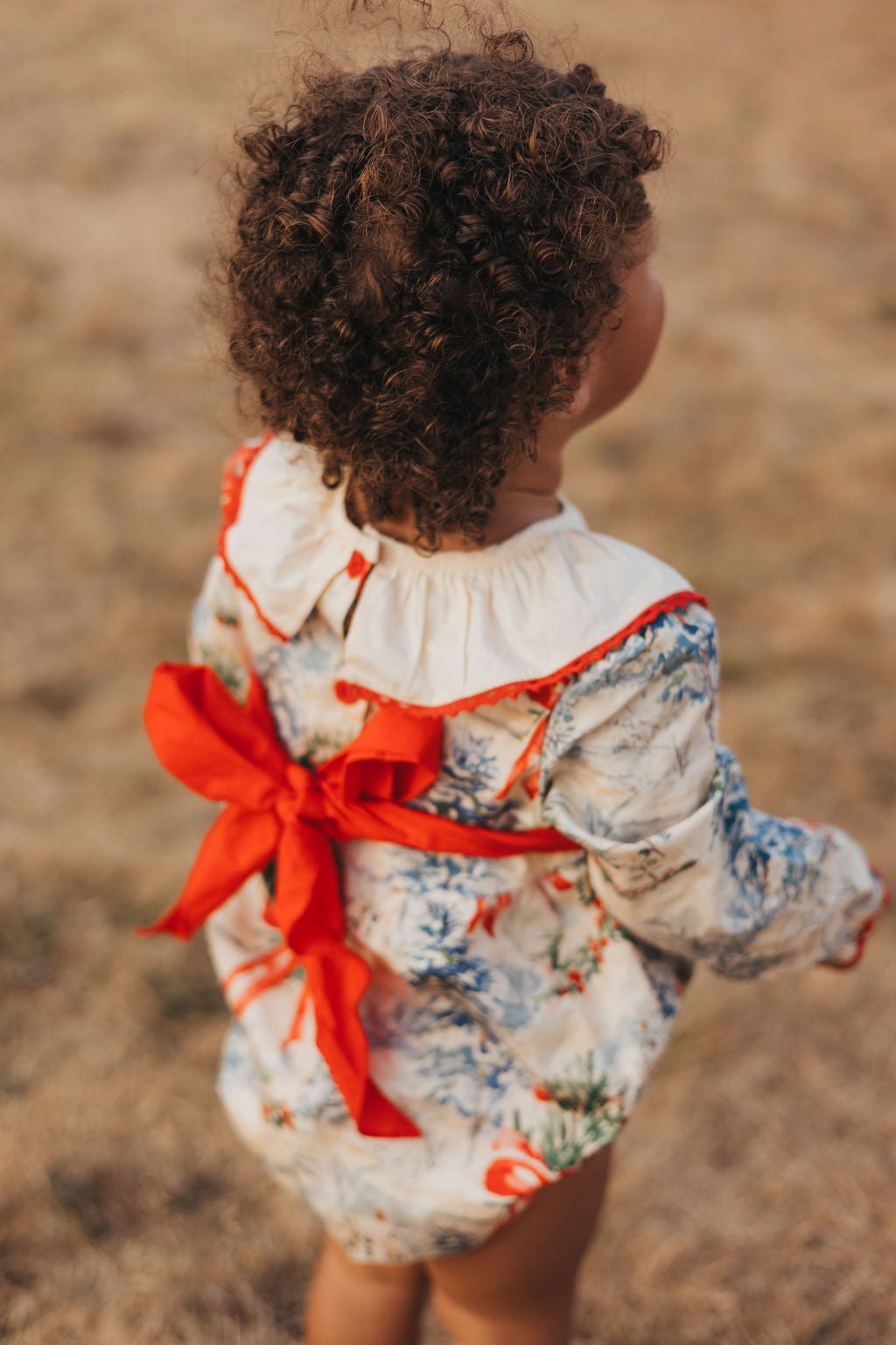 Winter cottage tie back romper