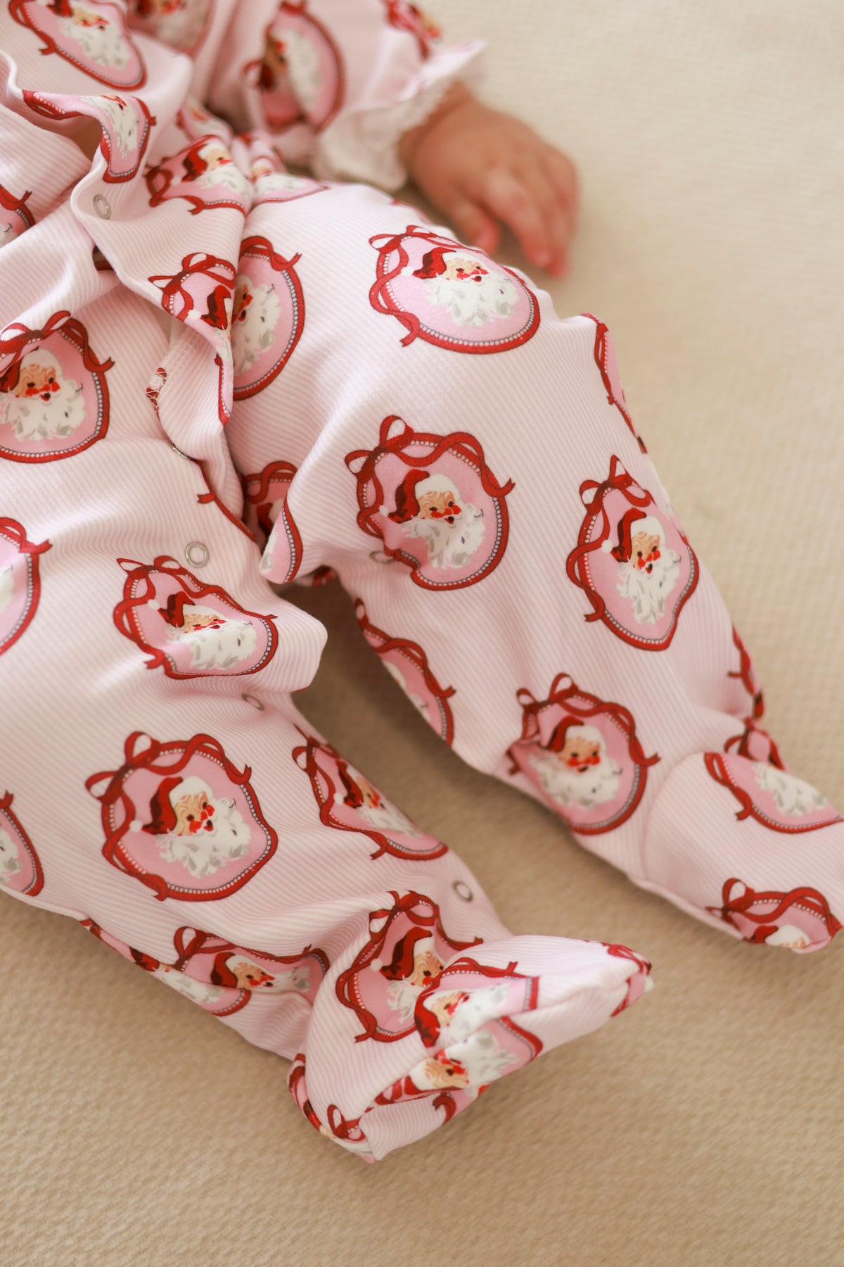 Pink santa stripe sleepsuit