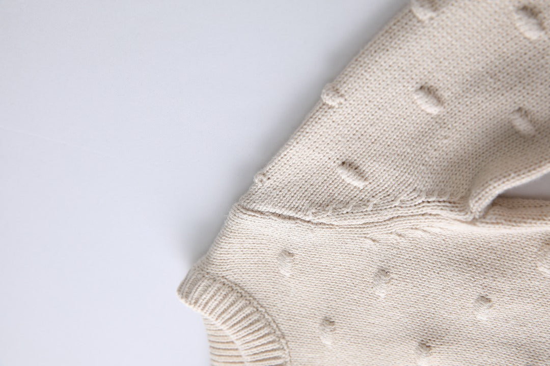Dotty knit jumpsuit (strictly one free item per order)